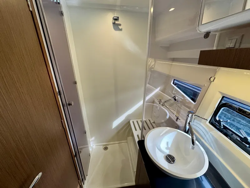 Slide: The Image of 2023 Jeanneau NC 1095 Fly bathroom with modern sink and shower. - 16