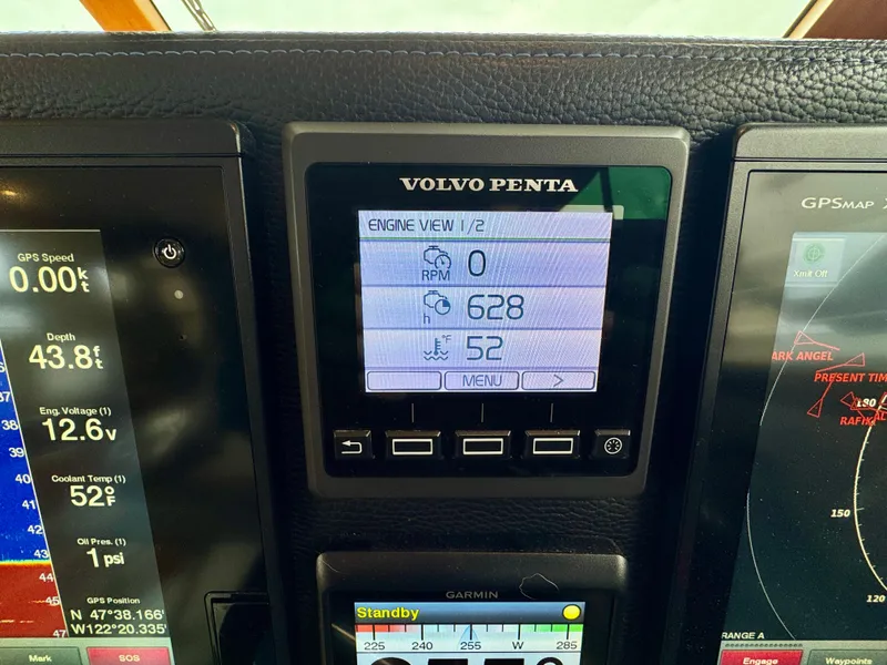 Slide: The Image of Volvo Penta engine display on 2018 Cutwater C-30 CB boat dashboard. - 15