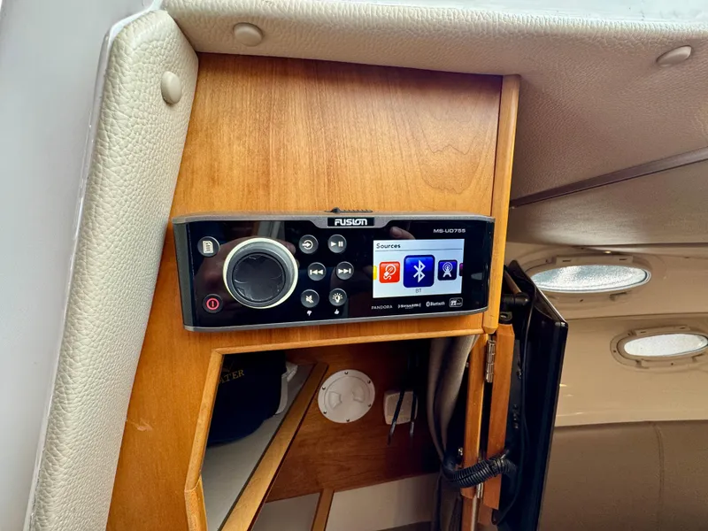 Slide: The Image of Fusion stereo system in 2018 Cutwater C-30 CB cabin, featuring Bluetooth connectivity. - 16