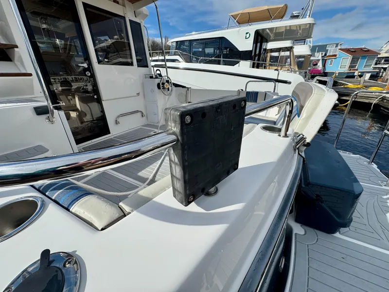 Slide: The Image of 2018 Cutwater C-30 CB boat deck with railing, docked at marina. - 7