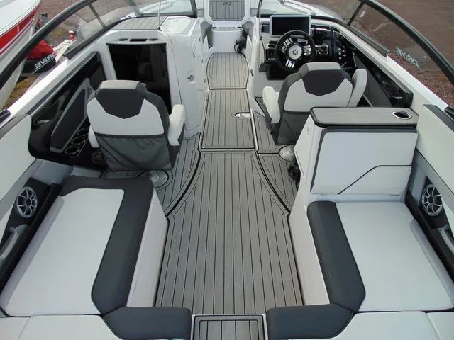 Slide: The Image of 2023 Yamaha Boats 252SD interior with sleek seating and modern design. - 11