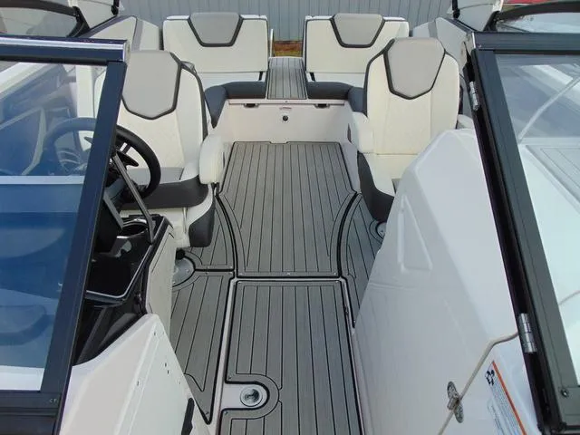 Slide: The Image of 2023 Yamaha Boats 252SD interior with sleek seating and modern design. - 27