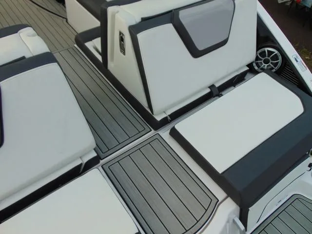 Slide: The Image of 2023 Yamaha Boats 252SD interior seating with sleek, modern design and premium materials. - 9