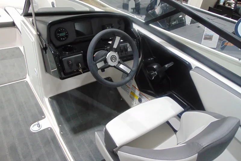 Slide: The Image of 2025 Yamaha Boats AR190 cockpit with modern steering and dashboard controls. - 17