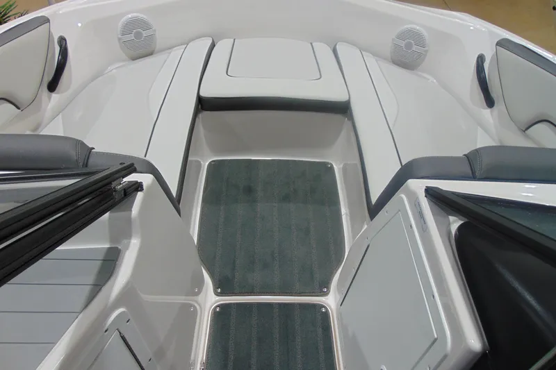 Slide: The Image of 2025 Yamaha Boats AR190 interior with cushioned seating and marine speakers. - 19