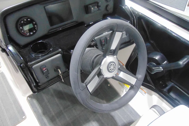 Slide: The Image of 2025 Yamaha Boats AR190 steering wheel and dashboard, featuring modern controls and sleek design. - 20