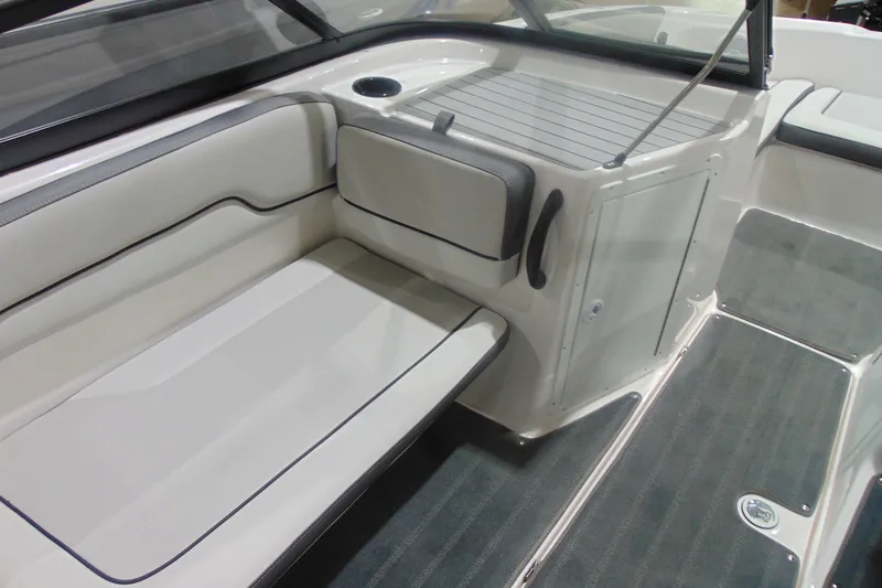 Slide: The Image of 2025 Yamaha Boats AR190 interior seating and deck area, featuring sleek design and comfort. - 21