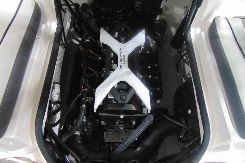 Slide: The Image of 2025 Yamaha Boats AR190 engine compartment showcasing high-output motor. - 22