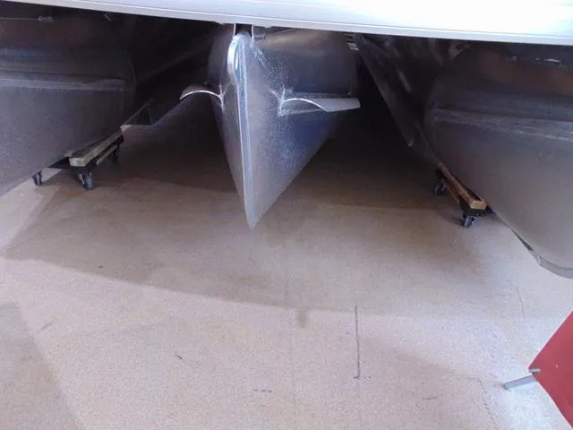 Slide: The Image of 2025 Godfrey Pontoons Sweetwater 2286 SFL Sport Tube, underside view showing pontoons. - 15