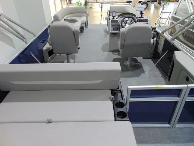 Slide: The Image of 2025 Godfrey Sweetwater 2286 SFL pontoon interior with seating and helm. - 2