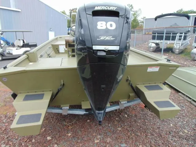 Slide: The Image of 2024 Crestliner 2070 Retriever CC boat with Mercury 80 engine, rear view. - 3