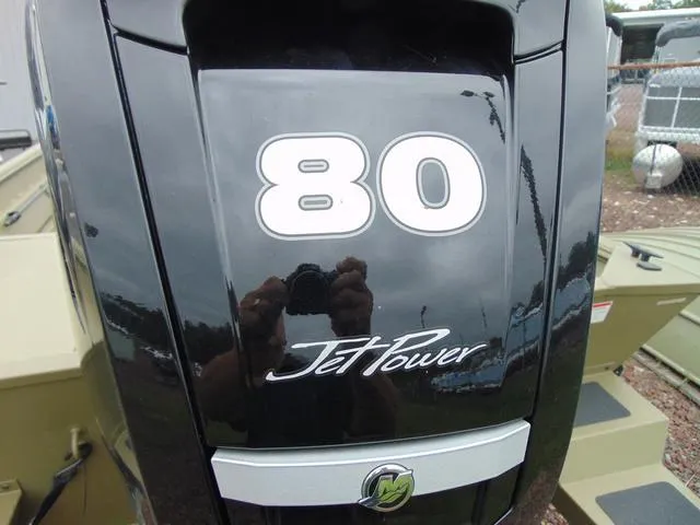 Slide: The Image of 2024 Crestliner 2070 Retriever CC with 80 Jet Power engine, close-up view. - 4