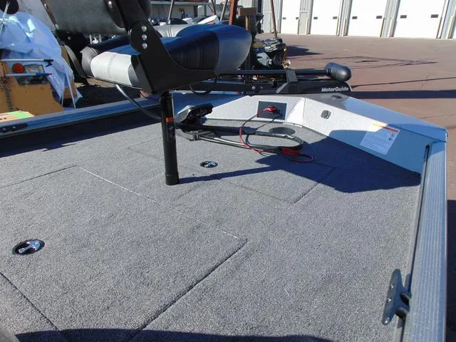 Slide: The Image of 2025 Crestliner 1700 Ridge boat deck with seat and MotorGuide trolling motor. - 8