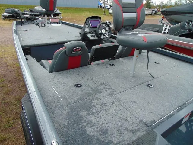 Slide: The Image of 2023 Ranger RT188C fishing boat interior with seating and steering console. - 3