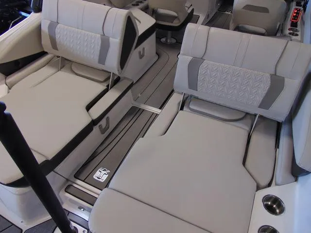 Slide: The Image of 2024 Hurricane SunDeck 2600 OB interior with luxurious seating and modern design. - 5