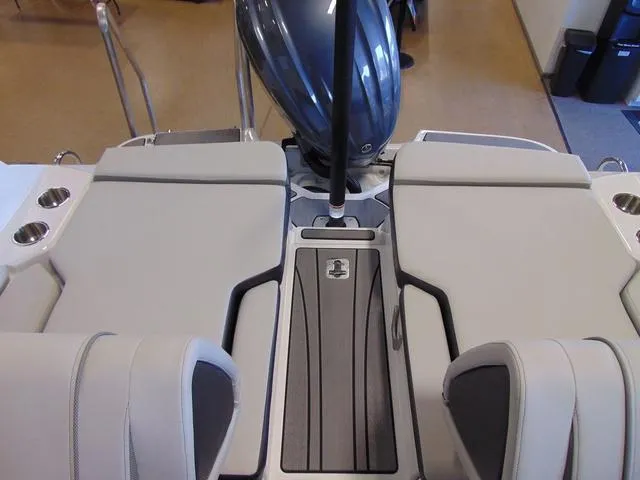Slide: The Image of 2024 Hurricane SunDeck 2600 OB boat interior with sleek seating and modern design. - 6