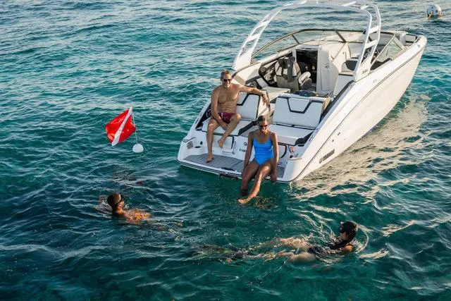 Slide: The Image of 2025 Yamaha Boats 252S interior with sleek seating and modern design. - 11