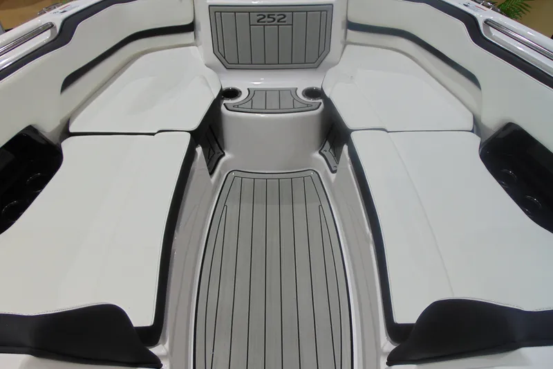 Slide: The Image of 2025 Yamaha Boats 252S interior with sleek seating and modern design. - 14