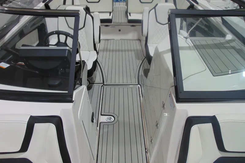 Slide: The Image of 2025 Yamaha Boats 252S interior with sleek seating and modern design. - 17