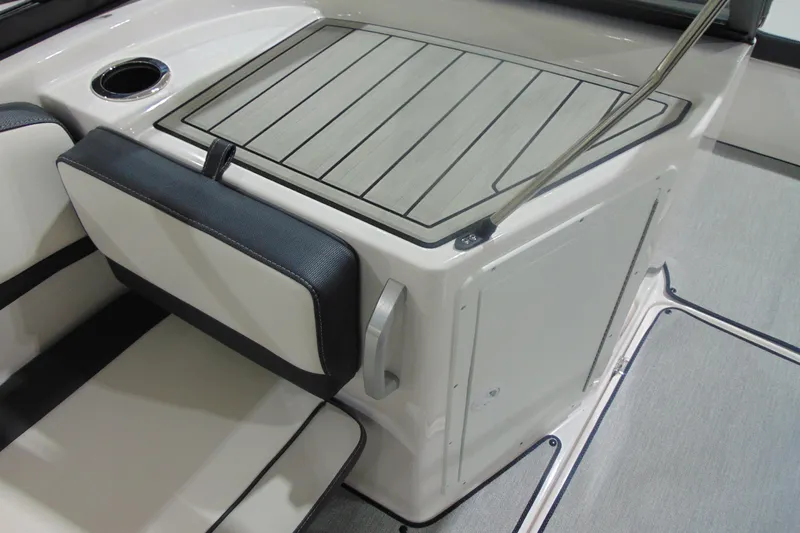 Slide: The Image of 2025 Yamaha AR195 boat interior with cushioned seating and sleek design. - 19