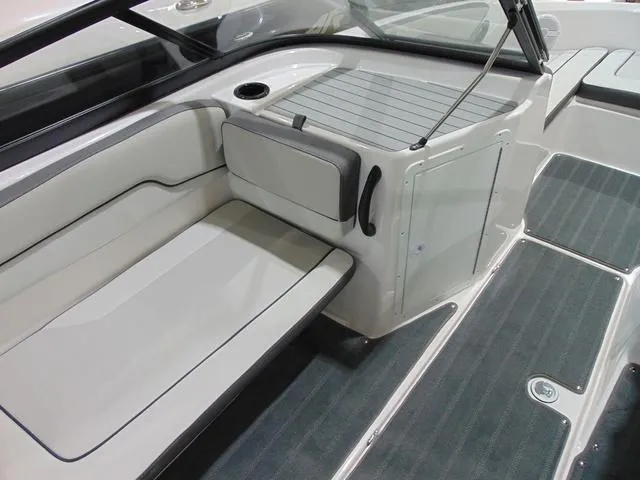 Slide: The Image of 2025 Yamaha Boats AR190 interior seating and deck area, featuring sleek design and modern amenities. - 13
