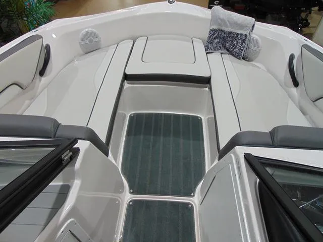 Slide: The Image of 2025 Yamaha Boats AR190 interior with spacious seating and modern design. - 14