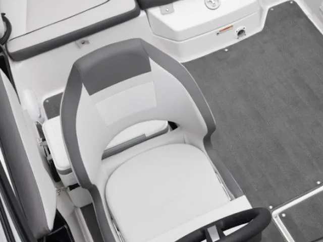 Slide: The Image of 2025 Yamaha Boats SX190 interior with gray and white seating and steering wheel. - 5