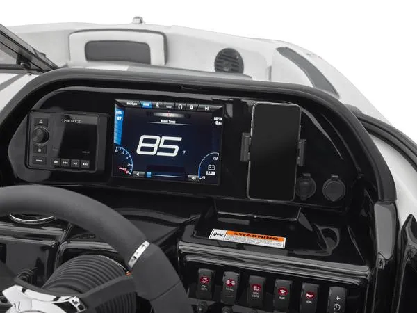 Slide: The Image of 2025 Yamaha Boats SX195 dashboard with digital display and controls. - 8