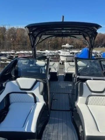 Slide: The Image of 2025 Yamaha Boats 275SD with sleek interior design and spacious seating. - 6