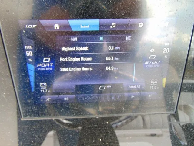 Slide: The Image of Dashboard display of a 2022 Yamaha Boats 252 FSH® SPORT showing engine data and speed. - 12