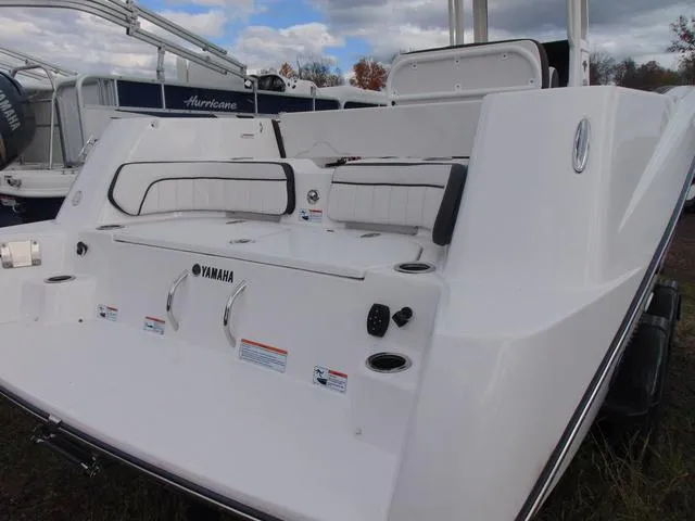 Slide: The Image of 2022 Yamaha Boats 252 FSH® SPORT, rear view, white exterior, docked outdoors. - 3