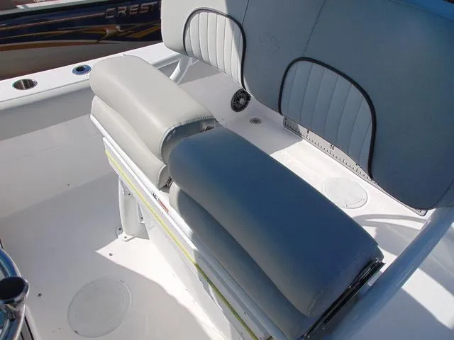 Slide: The Image of 2022 Sea Fox 249 Avenger boat seating with gray and white upholstery. - 12
