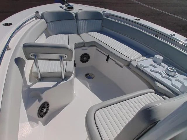 Slide: The Image of 2022 Sea Fox 249 Avenger boat interior with cushioned seating and modern design. - 17