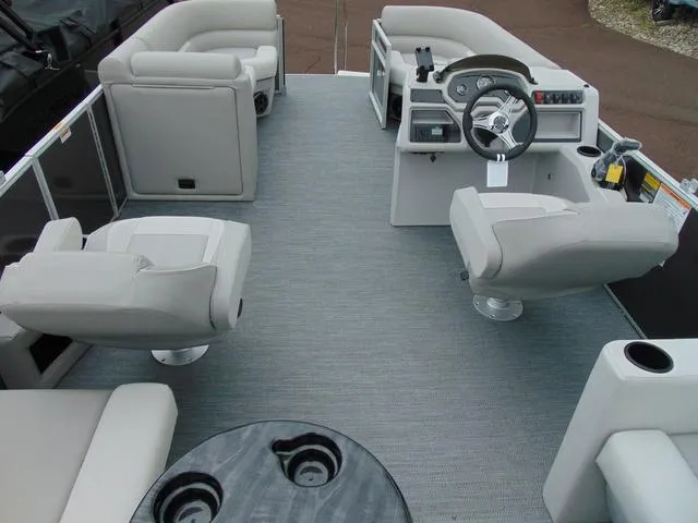 Slide: The Image of 2024 Godfrey Pontoons Xperience 2286 SBX interior with plush seating and modern amenities. - 6