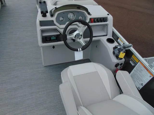 Slide: The Image of 2024 Godfrey Pontoons Xperience 2286 SBX interior with plush seating and modern design. - 7