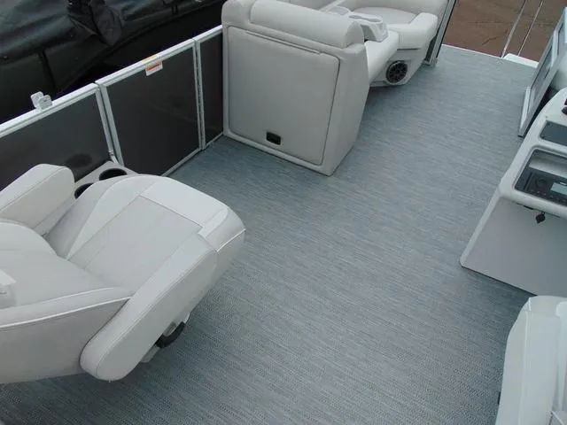 Slide: The Image of 2024 Godfrey Pontoons Xperience 2286 SBX interior with seating and table. - 8