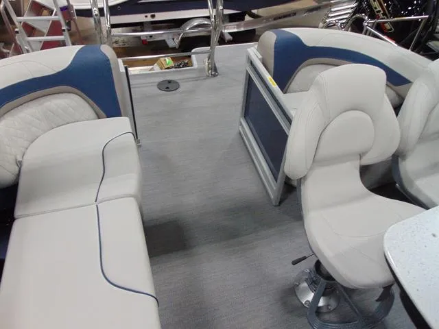 Slide: The Image of Interior of 2025 Godfrey Pontoons Sweetwater 2286 MT, featuring plush seating and modern design. - 7