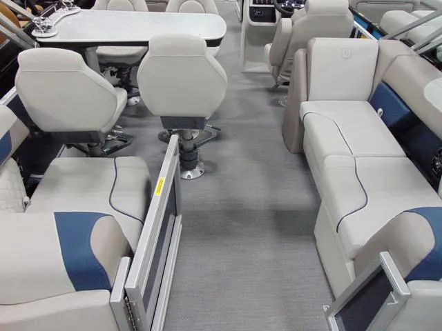 Slide: The Image of Interior of 2025 Godfrey Pontoons Sweetwater 2286 MT with sleek table and comfortable seating. - 8