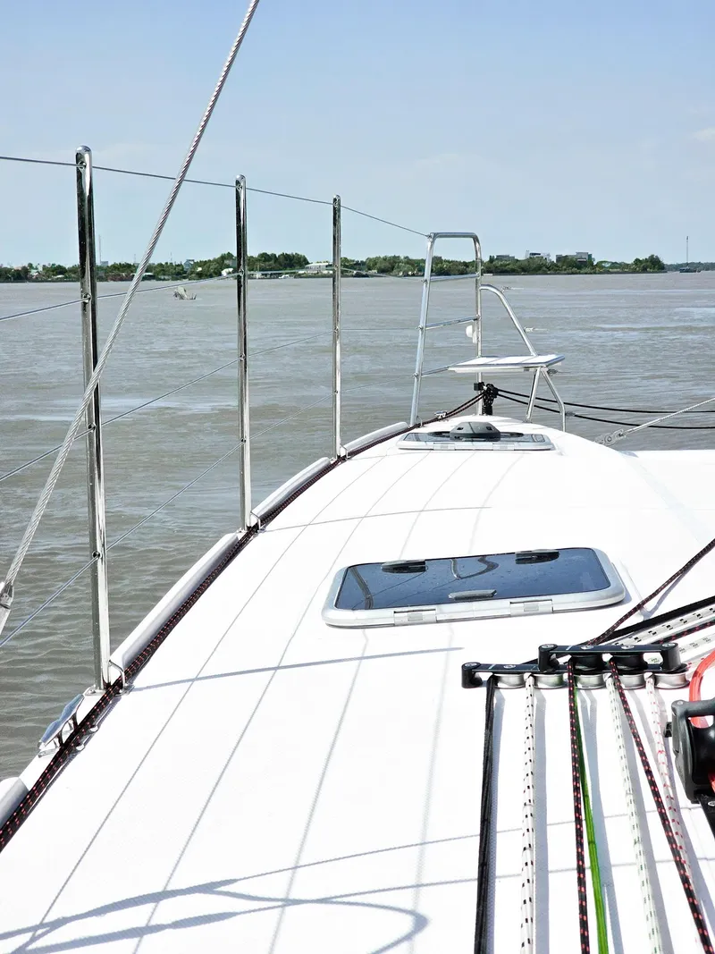 Slide: The Image of 2025 Seawind 1160 XL yacht deck with ocean view and clear sky. - 6