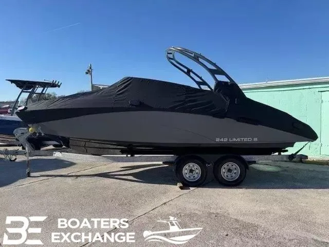 Slide: The Image of 2016 Yamaha Boats 242 LTD S on trailer, covered, at Boaters Exchange. - 2