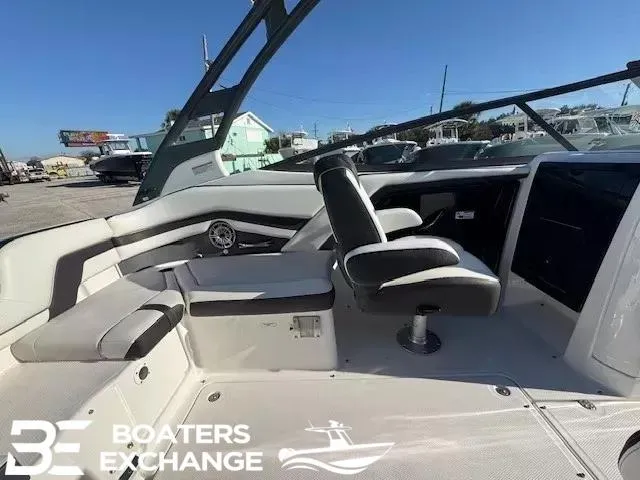 Slide: The Image of 2016 Yamaha Boats 242 LTD S interior with seating and steering, showcased at Boaters Exchange. - 6