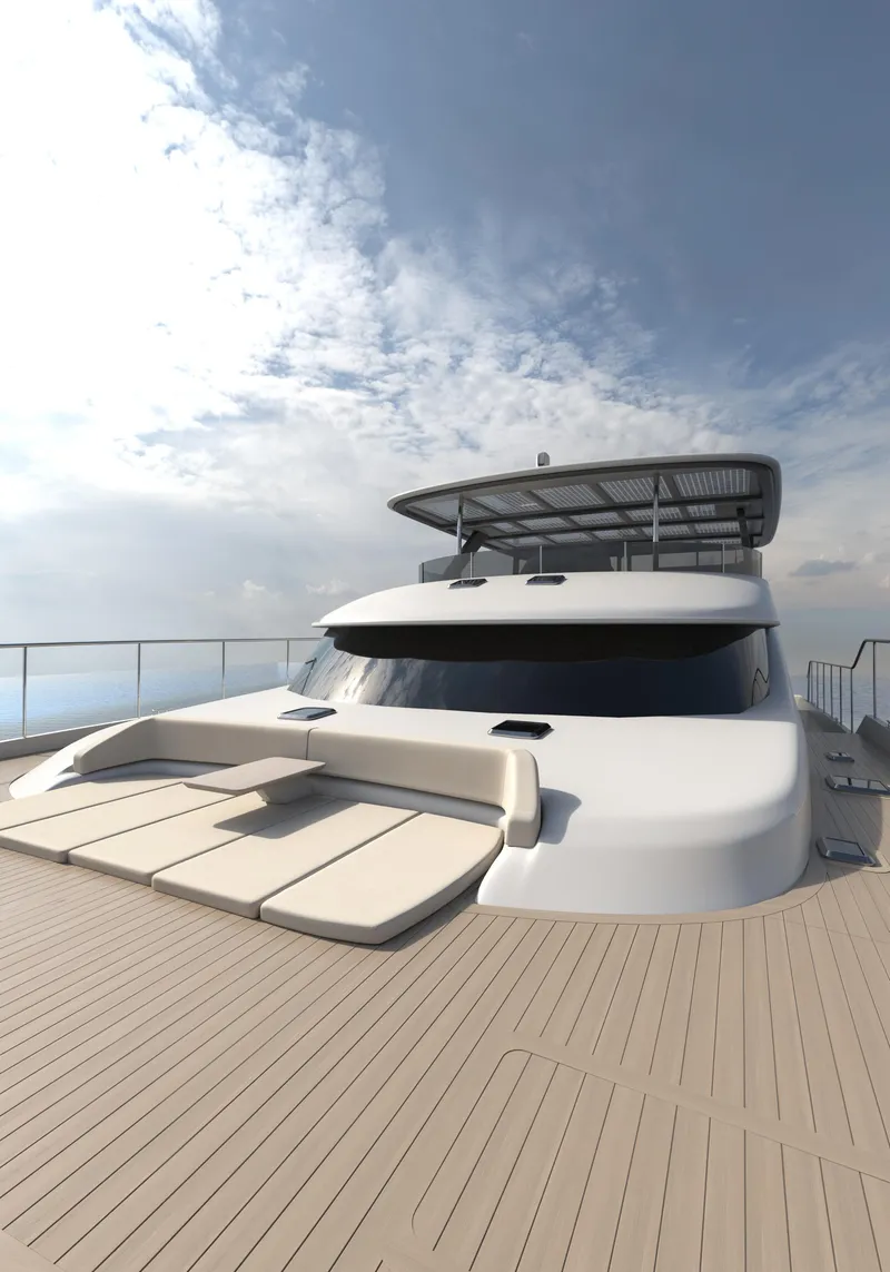 Slide: The Image of 2025 Catamaran HS 65 yacht with sleek design and spacious deck under a cloudy sky. - 12