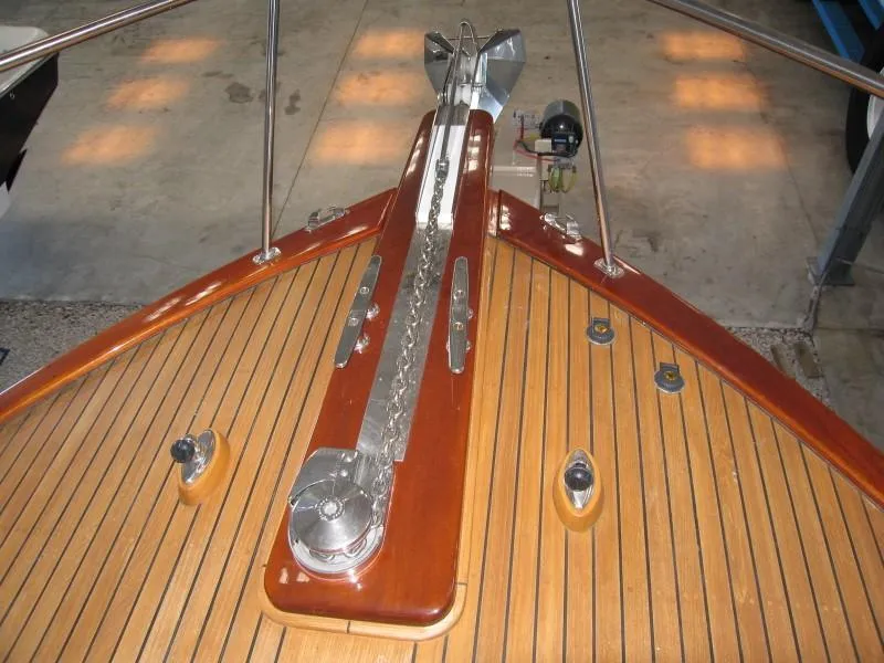 Slide: The Image of Bow of 2009 Hugh Saint 65 Commuter boat with polished wood and metal details. - 11