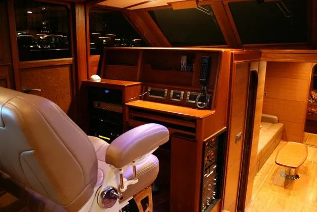 Slide: The Image of Luxurious interior of 2009 Hugh Saint 65 Commuter boat with leather seating and wooden finishes. - 15