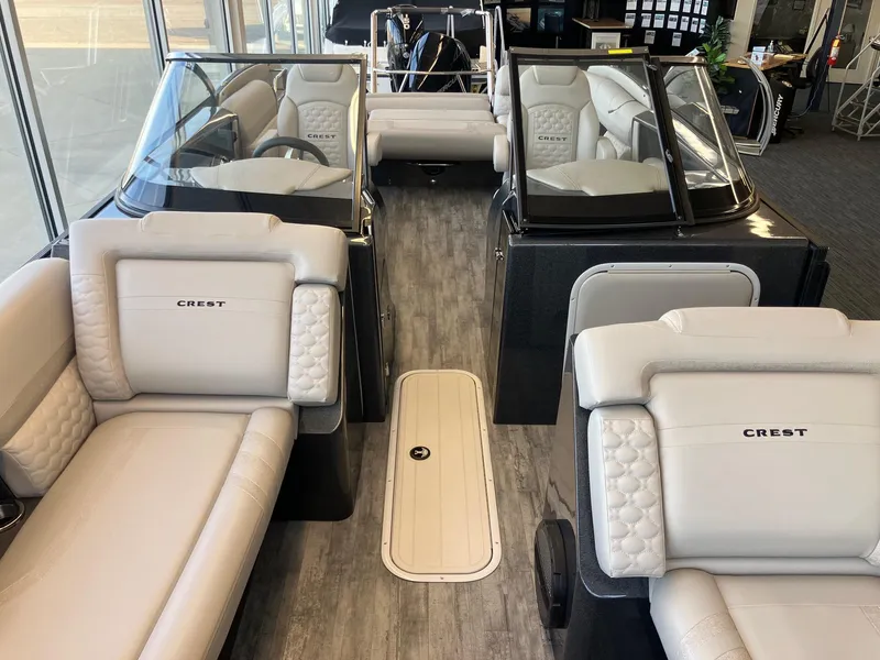 Slide: The Image of 2025 Crest Continental 250 SLS boat interior with luxurious seating and modern design. - 12