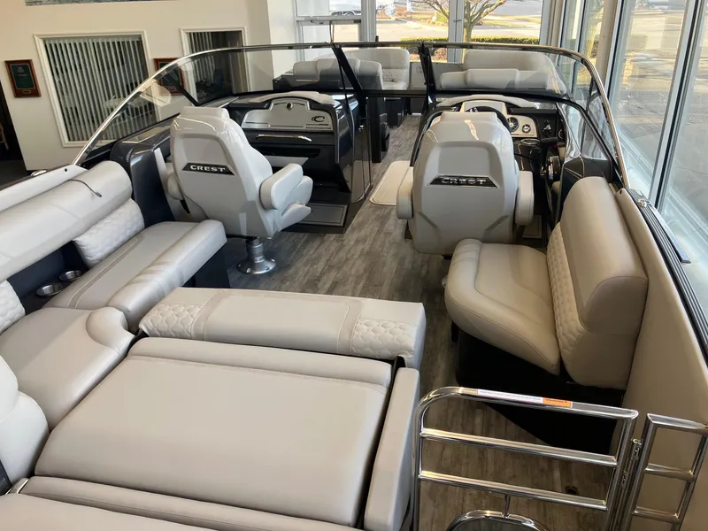 Slide: The Image of Luxurious interior of 2025 Crest Continental 250 SLS boat with plush seating and modern design. - 5