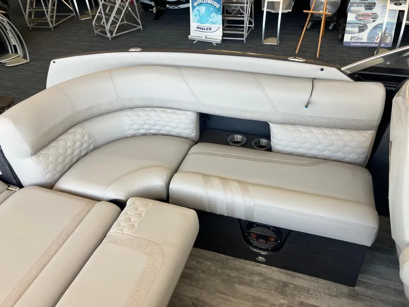 Slide: The Image of 2025 Crest Continental 250 SLS boat interior with luxurious seating and modern design. - 6