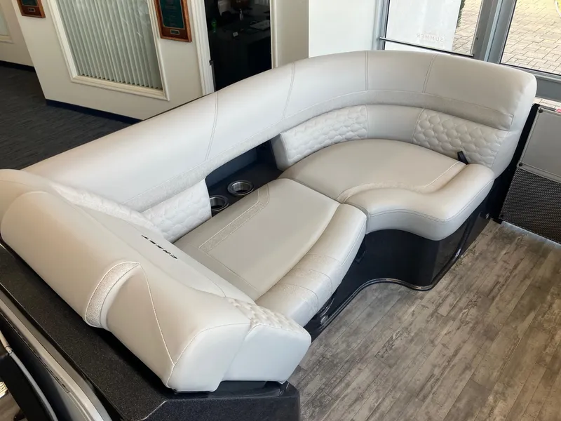Slide: The Image of Luxurious seating on 2025 Crest Continental 250 SLS boat, featuring elegant white upholstery. - 9
