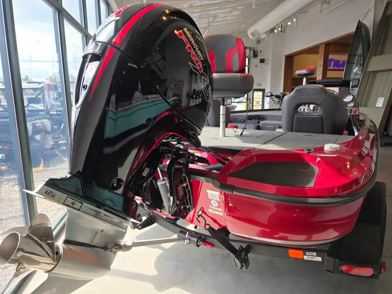 Slide: The Image of 2025 Nitro Z18 Pro boat with powerful outboard motor in showroom display. - 2