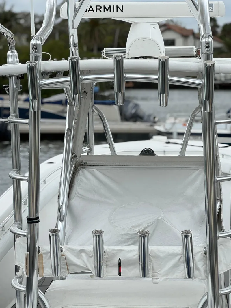 Slide: The Image of 2004 Palmetto 33 Adventure boat with stainless steel rod holders and Garmin equipment. - 3